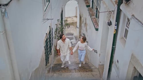 Romantic Couple Walking Stairs Up Tiny Street Happy Pair Enjoying Summer Date