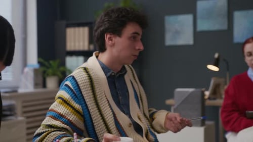 Team of Coworker Analyzing Strategy of Growth during Office Meeting