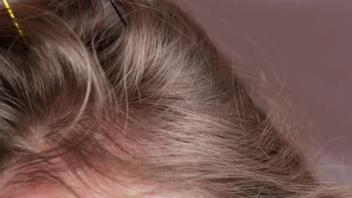 Unrecognizable Woman Enjoying Scalp Massage Through Massager at Home Close Up of Using Scalp