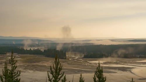 Tourists On Boardwalk At Grand Prismatic Spring In Yellowstone National Park In Wyoming USA. Timelap
