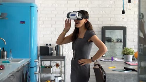 Woman Experiencing Virtual Reality in Kitchen