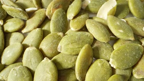 Green pumpkin seeds, also known as pepitas.