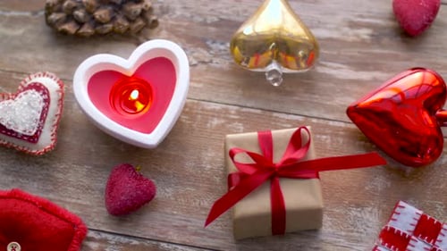 Heart Decorations and Gift on Wooden Table