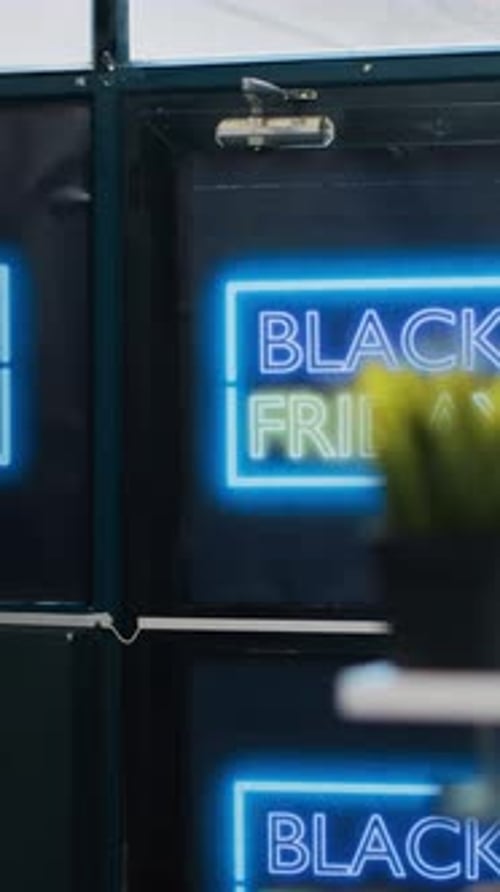 Neon Black Friday Sale Signage in Storefront