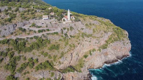 Aerial view of Far des Cap Gros, a lighthouse on the cliff, Mallorca, Spain.