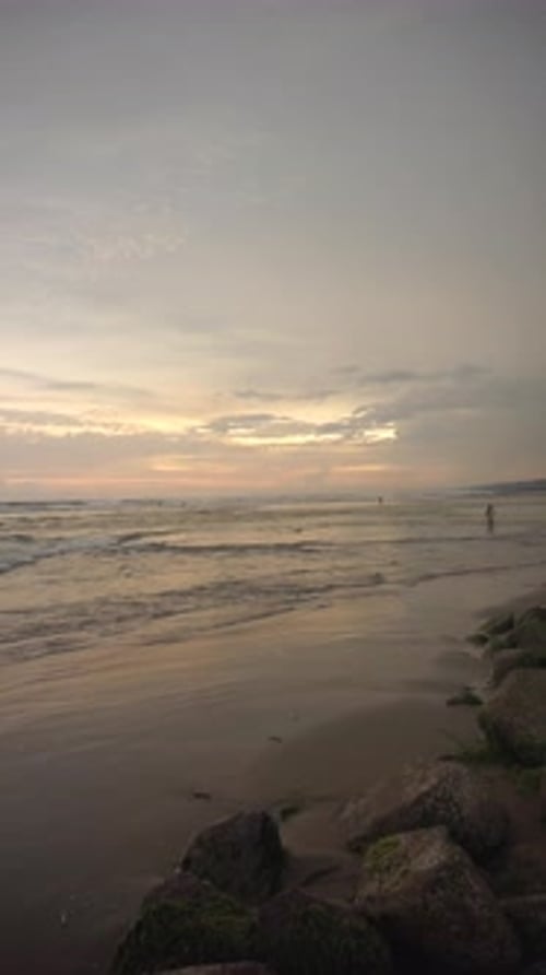 beautiful vertical video evening beach view before sunset with small waves on Cipatujah Tasikmalaya