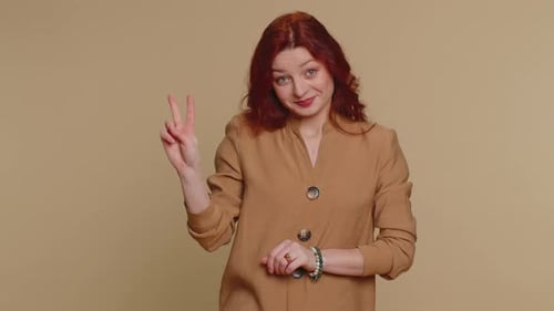 Woman Showing the Peace Sign with Two Hands