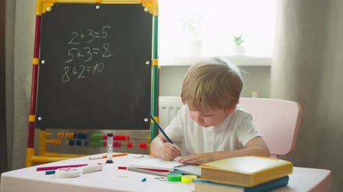 Child Learning at Desk