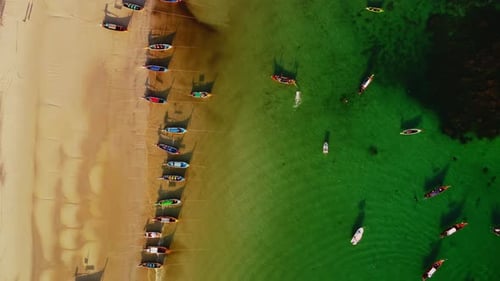 Longtail Motor Boat with Tourists is Approaching to Coast in the Sea After Water Walk