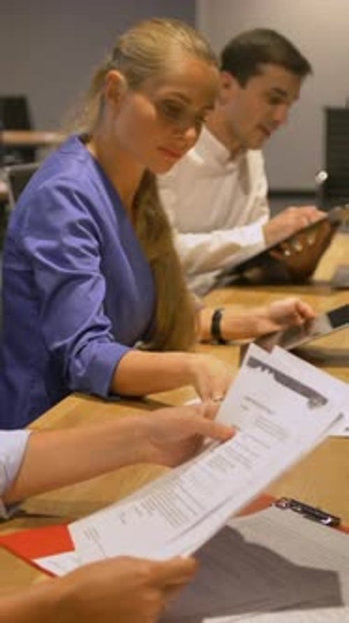 Group of Business People Meeting in Office