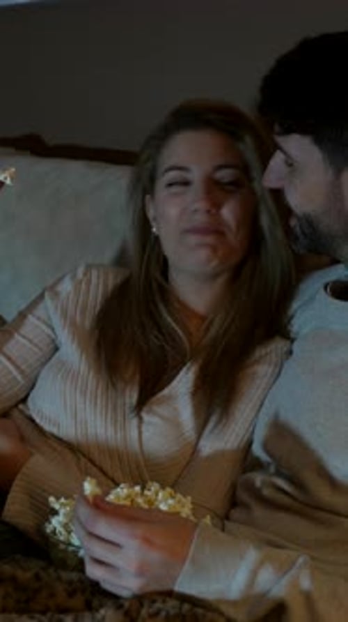 Couple Relaxing and Watching a Movie at Home