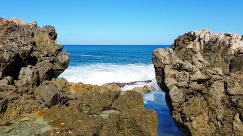 This Video Reveals the Oceans Beauty with Waves Crashing on Cliffs