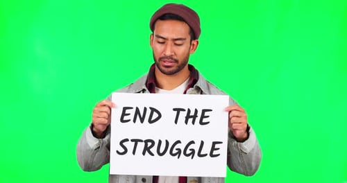 Young man, protest poster and green screen to end poverty, human rights