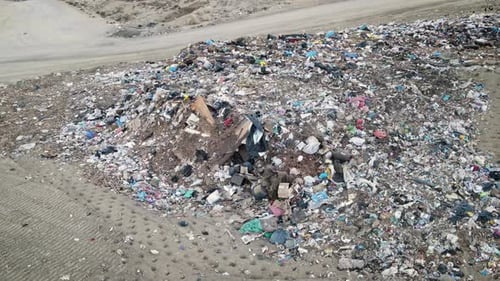 Aerial View of Landfill Waste in Desert Landscape