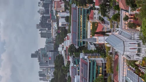Vertical day to night timelapse of Singapore's River Valley neighborhood.