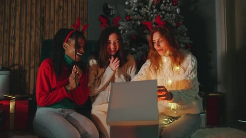 Friends Celebrate Christmas Opening Magical Gift