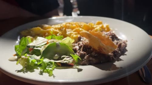 continental breakfast served on white plate at bar cafe restaurant