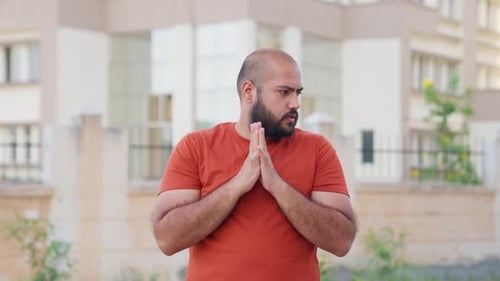 Bald indian Man Feeling Anxious