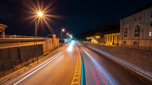 A Vivid Timelapse of a Fast Night Drive Through a Big City at Night