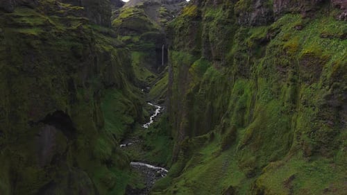 Aerial View of Fjadrargljufur Canyon with River and Waterfall in Iceland