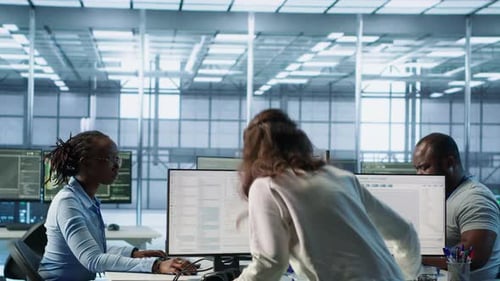 Admin Arriving in Server Hub Sitting at Computer Desk