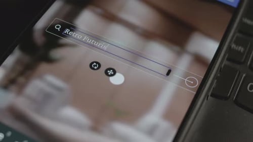 Typing Retro Futurism Into Tablet Search Bar