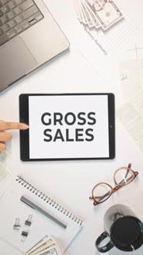 VERTICAL VIDEO OF GROSS SALES DISPLAYING ON A TABLET SCREEN