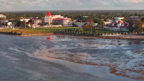 Drone flying to Royal Palace and Parliament House in Nuku'Alofa, Kingdom of Tonga, Pacific Islands.