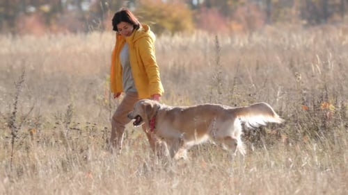 Girl with Golden Retriever Dog