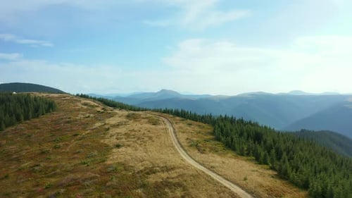 Aerial Mountain Path Scene with Stunning Rocky Pikes Background Against Sky. Tranquil