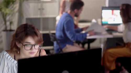 Team Collaborates on Project in Modern Office