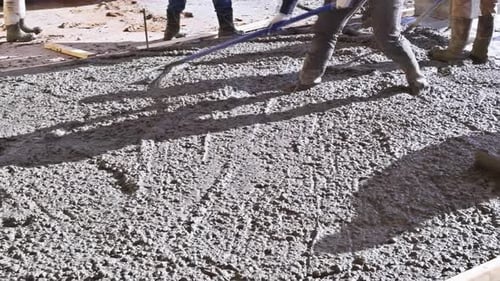 Pouring Wet Concrete Used for New Home Driveway