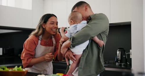 Happy Family Moments in Modern Kitchen with Infant