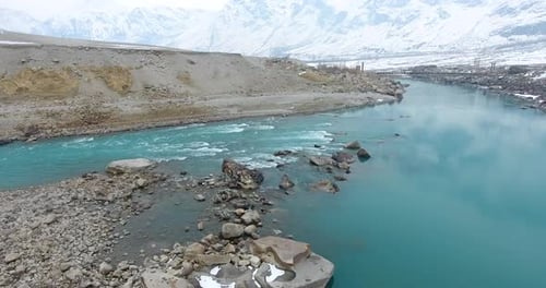 Aerial view of river through mountains, Pakistan.