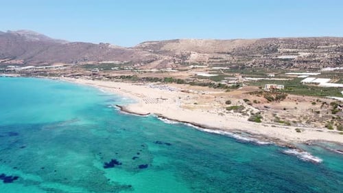 Panoramic aerial view over clear blue ocean and famous Falassarna Beach, Crete