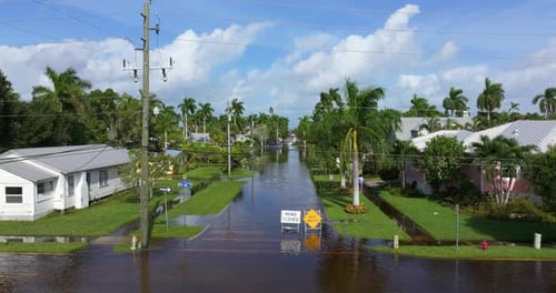 Road Closed Because of Flooding Danger with Warning Signs Blocking Driving of Cars Hurricane Milton