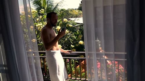 Man in Towel Listening to Music, Dancing, Singing on Terrace, Super Slow