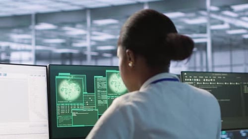 Woman Seeing Critical Error on PC Screen in Data Center