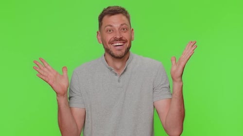 Man Reacts with Excitement on Green Screen