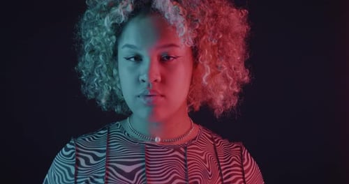 Glamorous Young Adult with Blonde Curly Hair