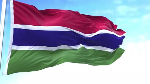 The Gambia Flag Waving Realistically in Blue Sky