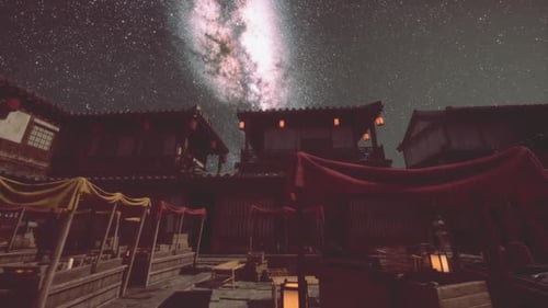 Traditional Japanese Village Illuminated Under a Stunning Starry Sky at Night