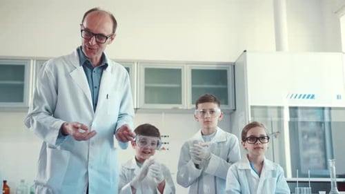 Science Class with Teacher and Students in Lab