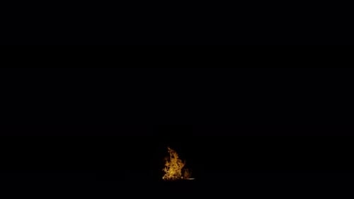 Ignite Collection: A 4k shot of small fire waves expelled from ground on dark background shot in 120