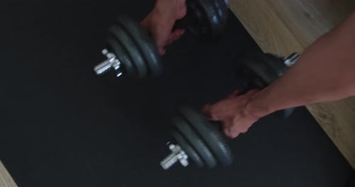 Dumbbells on Workout Mat