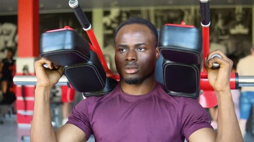 Black Bodybuilder Doing Squatting with a Barbell on Shoulder African Man Lifting Weight in Gym
