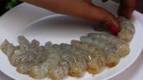 Peeled Shrimp Arranged on a White Plate