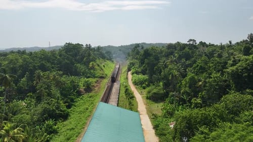 Drone Following A Train Leaving A Station