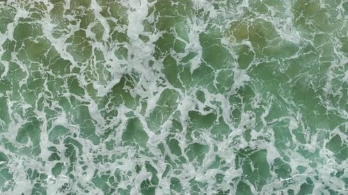 Aerial View Storm and Azure Waves at Sunset
