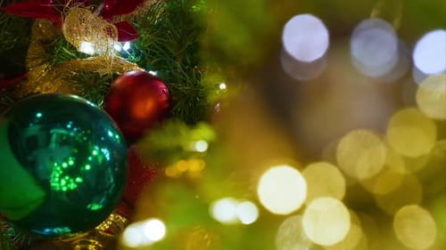 Christmas Ornaments on Lit Tree for the Holidays
